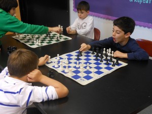 Two students play a game of chess