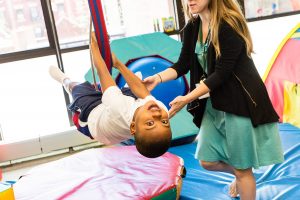 A student participating in Occupational Therapy