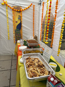 Traditional Indian breakfast items set up on a yellow table for Breakfast My Way