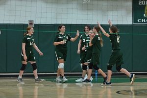 Gaynor girls volleyball team comes together for a high five