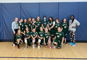 The entire Gaynor girls volleyball team poses for a photo