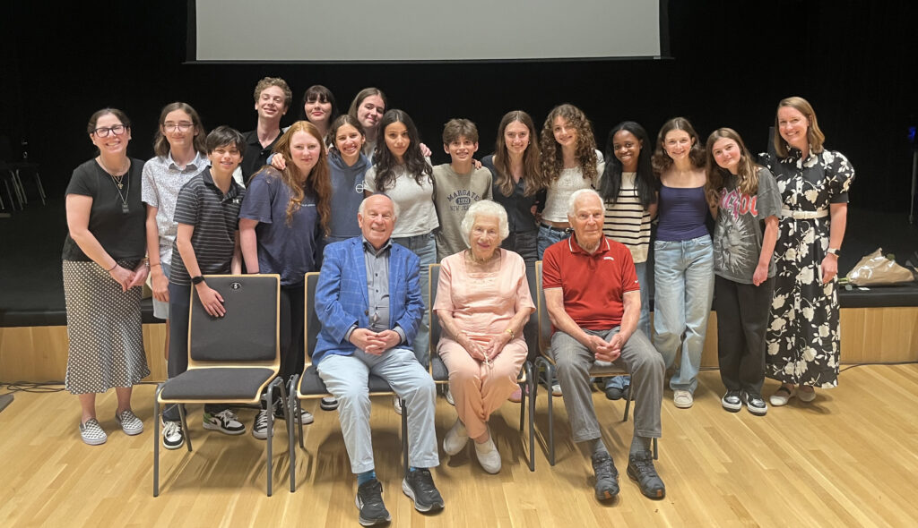 Student participants and the Holocaust survivors they interviewed at the Names, Not Numbers premiere in June 2024