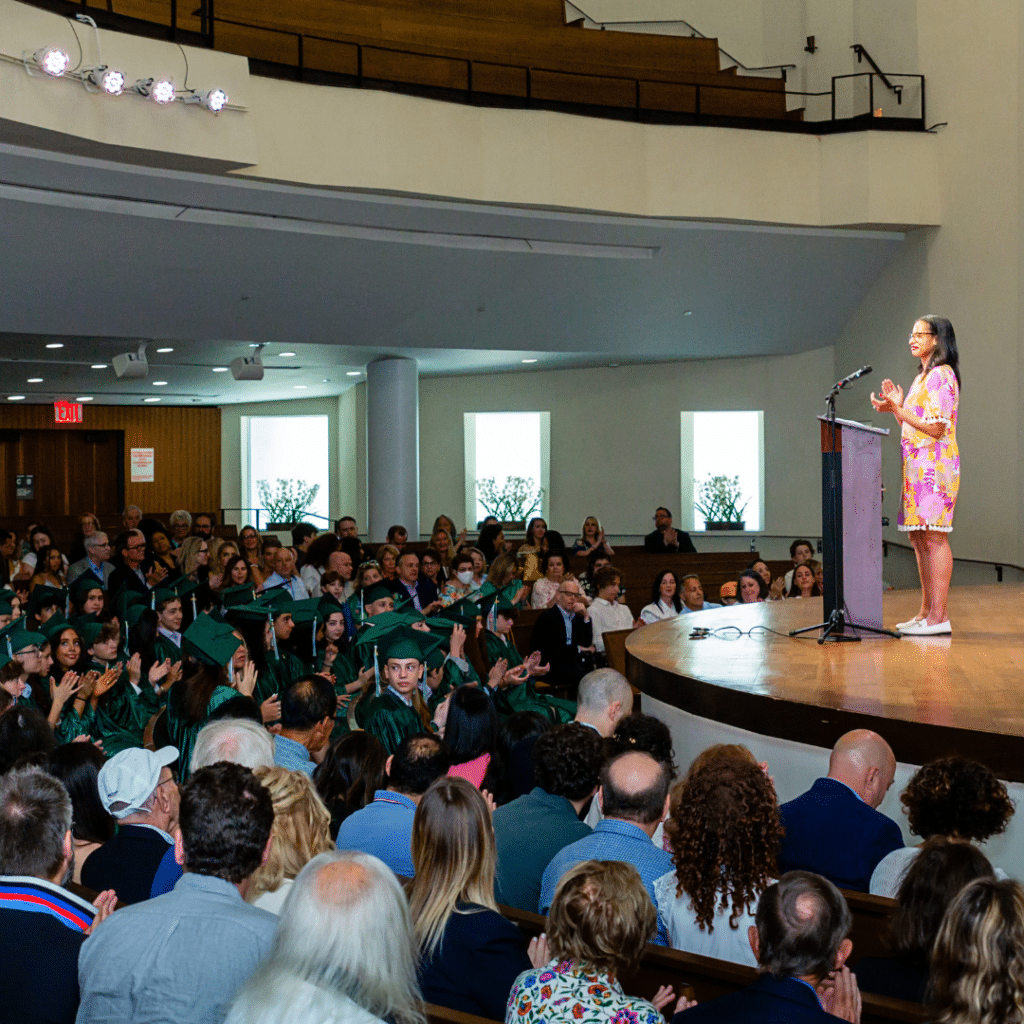 Board Chair Megan Hogan speaking to graduates