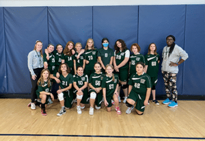 The entire Gaynor girls volleyball team poses for a photo
