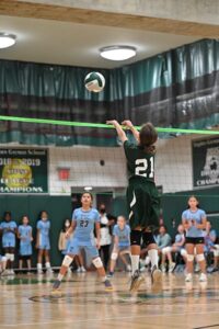 Gaynor volleyball player sets the ball